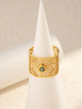 Bague dorée ajourée ornée de pierre naturelle ajustable