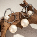 Boucles d’oreilles pendantes élégantes perles